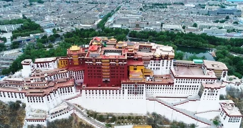 Drone flyover with full top and front view of Potala Palace, while backing up Stock Footage 93055037