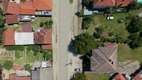 Drone flyover of gardens and greenery in a Bulgarian village Stock-Footage 344627042