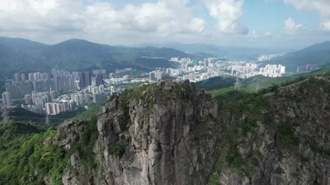 Drone flyover of iconic Lion Rock Stock Footage 161699826