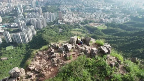 Drone flyover of iconic Lion Rock Stock Footage 162205246