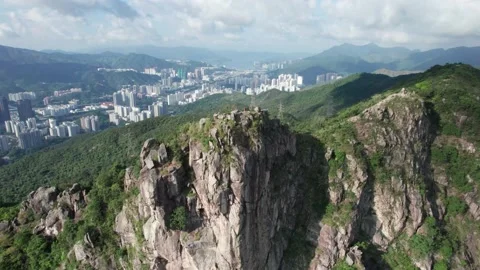 Drone flyover of iconic Lion Rock Stock Footage 162205265