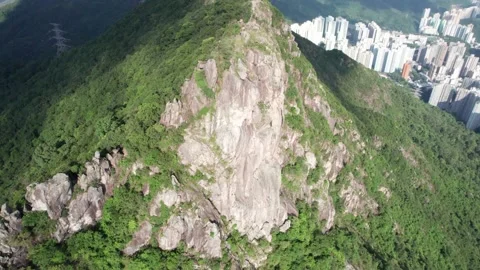 Drone flyover of iconic Lion Rock Stock Footage 162205267