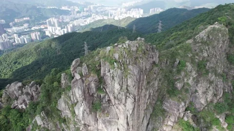 Drone flyover of iconic Lion Rock Stock Footage 162205273