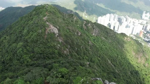 Drone flyover of iconic Lion Rock Stock Footage 162205275