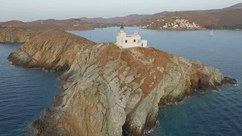 Drone Flyover of Island Lighthouse at Sunset in Greece HD Stock Footage 128043357