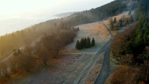 Drone flyover, landing in the Forest Mountain Above Clouds, Czech Republic Stock Footage 169591417