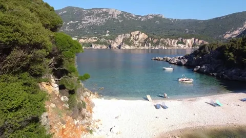 Drone Flyover From Limni Beach to Electric Blue Water, Corfu Stock Footage 337732438