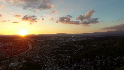 Drone flyover Los Angeles freeway at sunset Video stock 87754854
