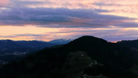 Drone flyover mountain valley at sunset 스톡 동영상 331867198
