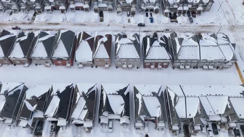 Drone Flyover Of New Build Homes In A Housing Development In Winter During Stock Footage 332152811