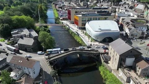 Drone flyover of the Old Bridge and town centre of Pontypridd Stock Footage 251026930