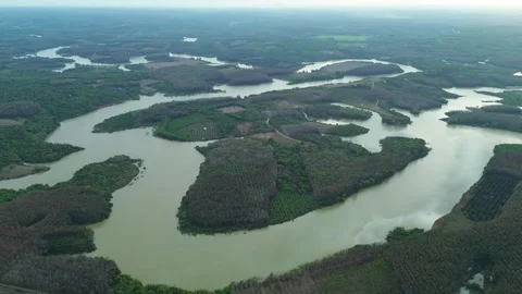 Drone Flyover of Patchwork Farmland with a Meandering River in Southern Vietnam 库存影片 329916453