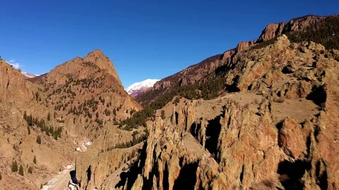 Drone flyover of Pinnacles rock formation and into canyon in Creede, CO. Stock Footage 103544594