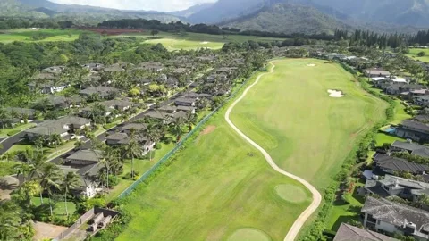 Drone flyover of Queen Emmas Bluff section of Princeville, Kauai, Hawaii, part 2 Stock Footage 299965739