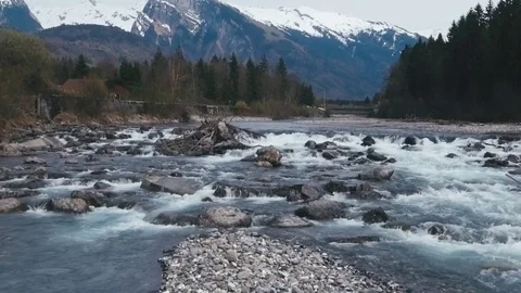 Drone Flyover of the River Giffre and Samoens Alpine Valley Stock Footage 74076565