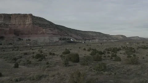 Drone flyover shot of plain by a mountain Stock-Footage 161814169