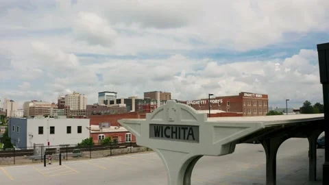 Drone flyover shot union train station sign downtown Wichita Kansas 4k Stock Footage 155356369