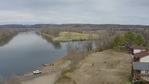 Drone Flyover Shot of the White River Meeting the Norfork River in Norfork, AR Stock Footage 172830960