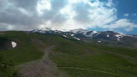 Drone Flyover of Snowy Mountain Slopes Stock Footage 337101285