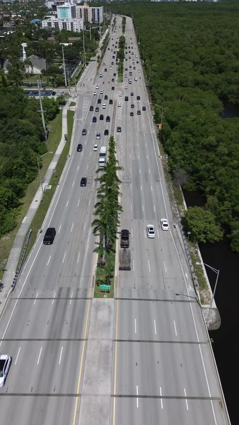 Drone Flyover - Traffic Over Mangrove Bridge, Miami Stock Footage 340533247