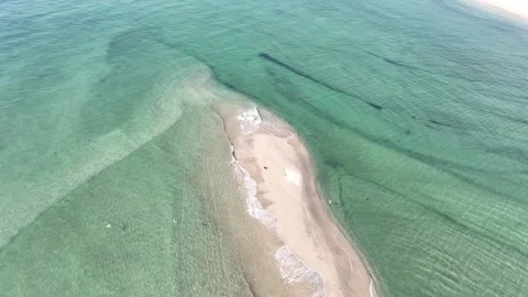 Drone Flyover of Tropical Sandbar with Clear Blue Green Water Stock Footage 312439293