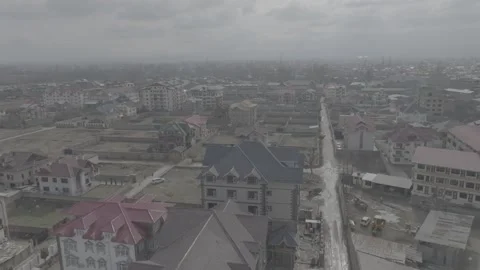 Drone flyover of urban development and houses in Srinagar Stockbeeldmateriaal 327443399