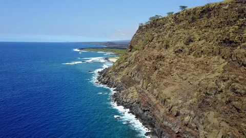 Drone flys along island cliffs Stock Footage 101997843
