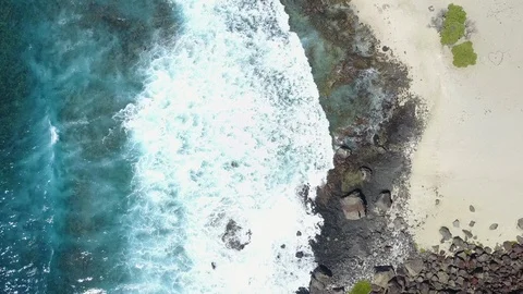 Drone flys over beach looking straight down 스톡 동영상 102006748