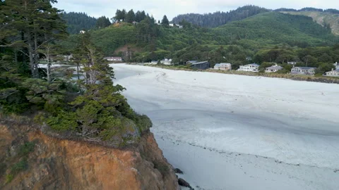 Drone flys by Proposal rock towards the beach Stock Footage 249028851