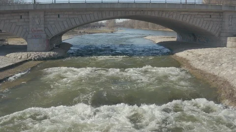 Drone Flys Thrue Bridge At The Isar In Sunny Winter Munich Stock Footage 119278055