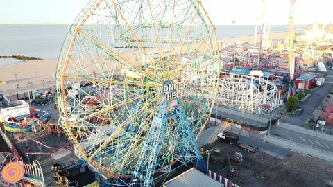 Drone flys to Wonder Wheel ferris wheel Coney Island Stock Footage 129759405