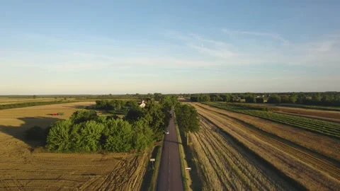 Drone Flythrough Above Beatiful Country Road During Sunset Stock Footage 213889595
