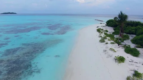 Drone flyuing along Maldive paradise tropical island Stockbeeldmateriaal 197357557