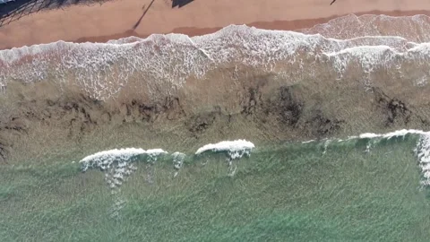 Drone follow a wave to the beach Stock Footage 151700898