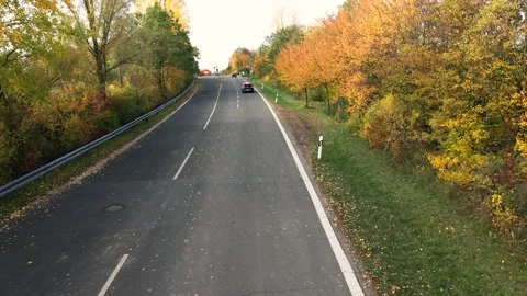 Drone following car in fall 库存影片 230023796