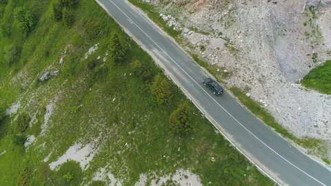 Drone following car through mountain pass, 4k drone footage Stock Footage 110269964