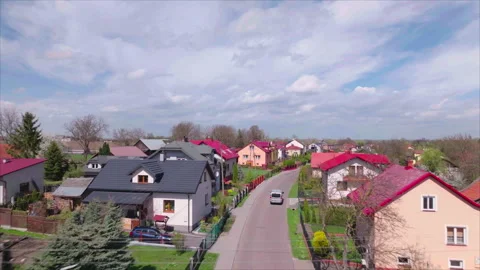 Drone following road through rural hamlets in Tuczempy, Poland Vídeo Stock 339172452