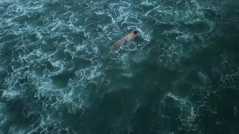 Drone follows the fire floating in the open sea or ocean. The element of water 스톡 동영상 229788945