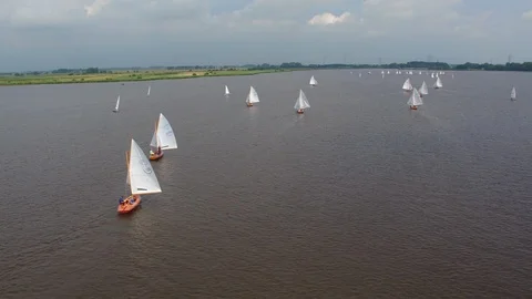 Drone footage of 16-square sailing race during 71st Schildweek on Schildmeer Stock Footage 100302445