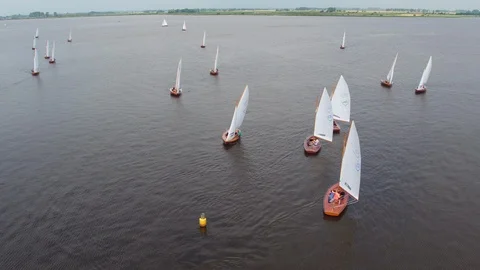 Drone footage of 16-square sailing race during 71st Schildweek on Schildmeer Stock Footage 100302822