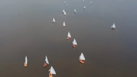 Drone footage of 16-square sailing race during 71st Schildweek on Schildmeer Stock Footage 100303629