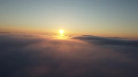 Drone Footage Above Clouds at Sunset Video stock 253091224