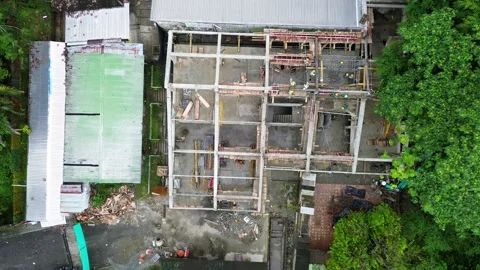 Drone Footage of Active Construction Site with Workers and Machinery Stock Footage 308045213