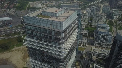 Drone footage (aerial), Top View of city blocks with new high rise condominiums. Stock Footage