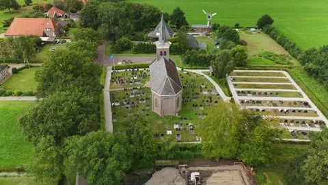Drone Footage of Ancient Chapel Surrounded by Grass 4K Video stock 317402880
