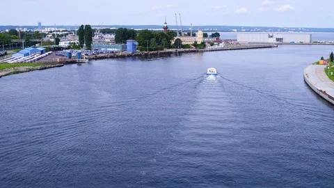 Drone footage of a backwards movement of the camera showing water tram going Stock-Footage 112055777