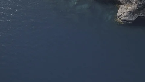 Drone footage of a beach in, Raw 4k Aerial Stock Footage 89865544