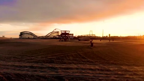 Drone footage of beach at sunset. Stock Footage 140643297