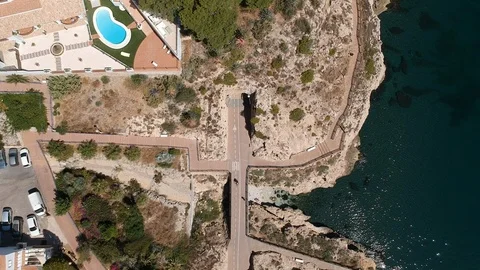 Drone footage Bicycles going close to the beach Stock Footage 130141547