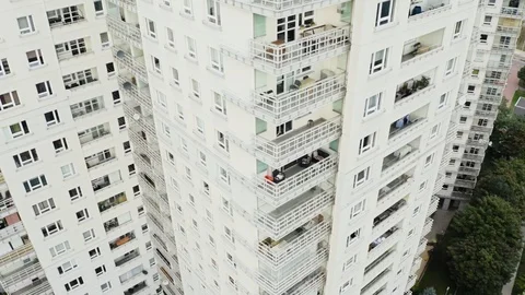 Drone footage of block of flats, multiple apartments, windows and balconies Stock Footage 95117519